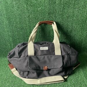 Stylish Black Duffel  overnighter Bag with Cream Accents